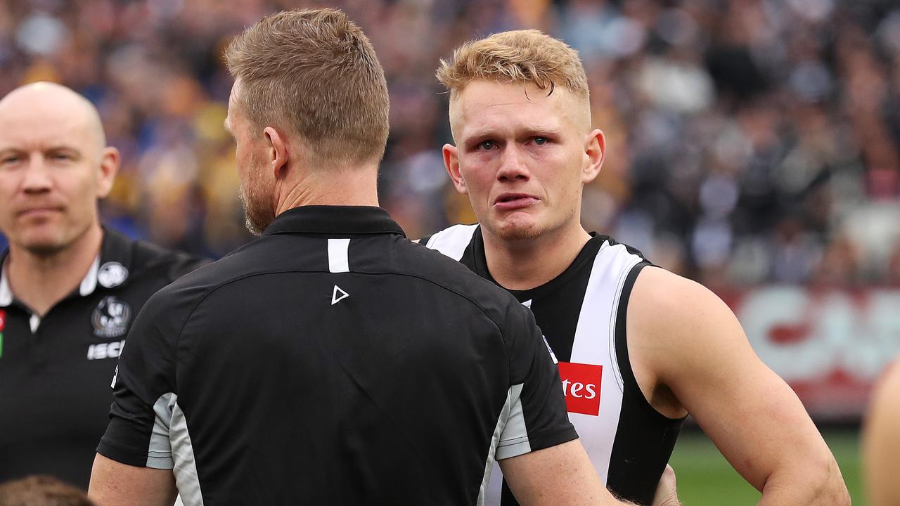 Dejected Adam Treloar and Collingwood coach Nathan Buckley after losing to the West Coast Eagles in the 2018 AFL Grand Final at the MCG. Picture: Phil Hillyard