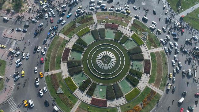 People gather around Umayyad Square in Damascus after rebels declared they had taken the city. Picture: AFP