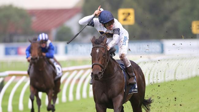 Jockey Ben Melham charges home on She Will Reign to win the Longines Golden Slipper during Golden Slipper Day at Rosehill. Picture: AAP