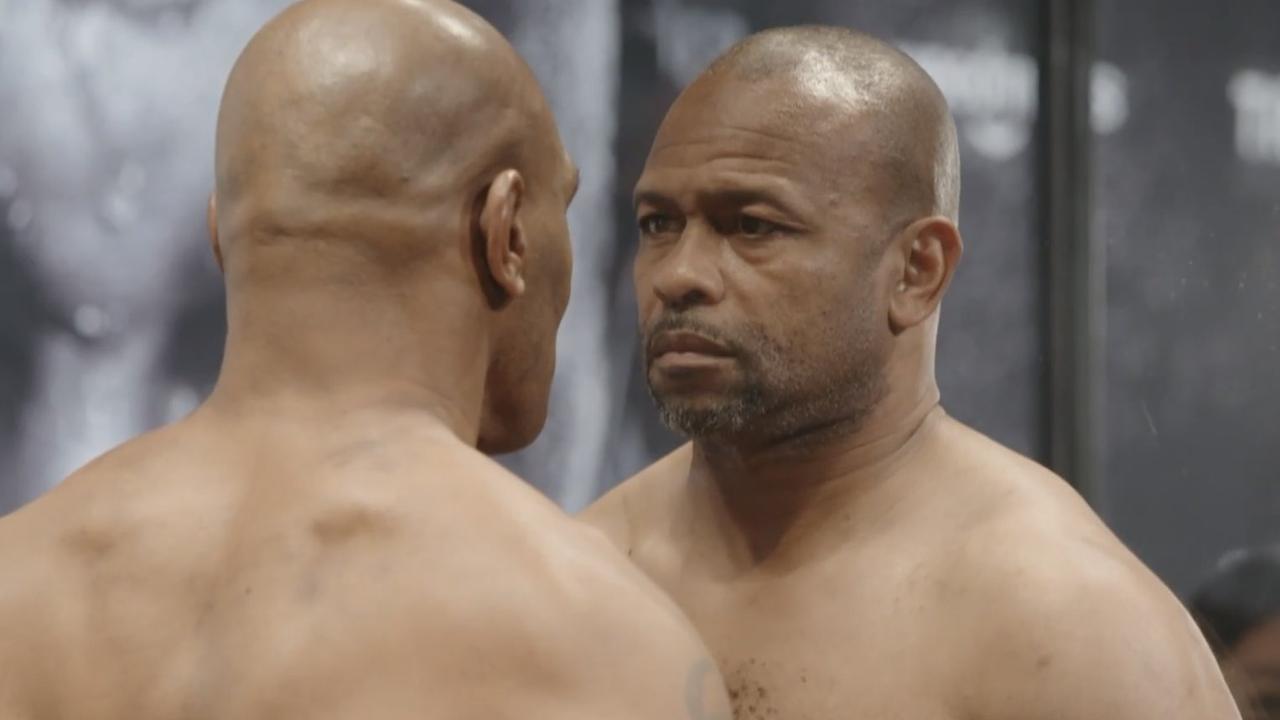 Mike Tyson and Roy Jones Jr. face off at the weigh-in.