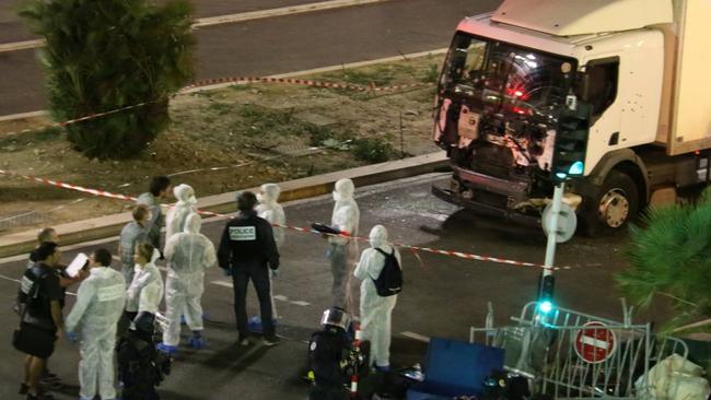 A police team has cordoned off the area surrounding the truck used to mow down bystanders at Bastille Day celebrations in Nice, France. Picture: Sasha Goldsmith