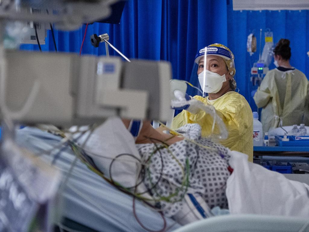 A nurse works on a patient in the ICU in St George's Hospital in southwest London, where the number of intensive care beds for the critically sick has had to be increased from 60 to 120, the vast majority of which are for coronavirus patients. Picture: Victoria Jones / PA Images via Getty Images