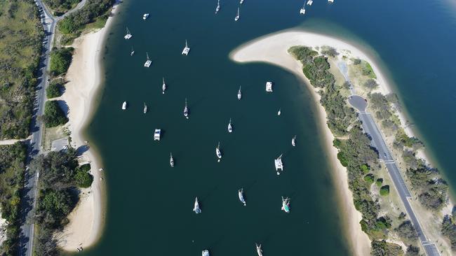 An aerial view of yachts and house-boats moored in 'Bums Bay' at Main Beach on the Gold Coast. AAP Image/Dave Hunt.