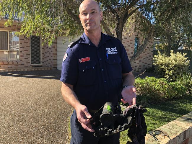 Fire &amp; Rescue NSW Duty Commander Illawarra Andrew Erlik with the heating device that caused the blaze.