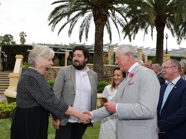 The Prince of Wales meets an excited Maggie Beers as Chef Duncan Welgemoed looks on, November 2015. Picture: Dylan Coker