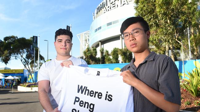 Max Mok (right) was one of the protesters who was asked to remove a Free Peng Shuai tee at the Australian Open on Saturday. Picture: Josie Hayden