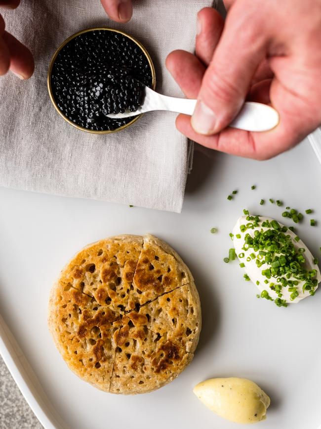 Huon Me crumpet with Calvisius white sturgeon caviar. Picture: Adam Gibson