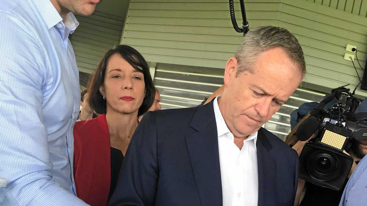 Mark Cielens, Belinda Hassan and Bill Shorten view plans for Harrup Park&#39;s Great Barrier Reef Arena. Picture: ANGELA SENG