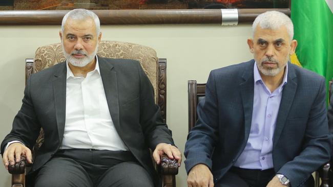 Hamas leaders Ismail Haniyeh, killed in Tehran, and Yahya Sinwar attend a meeting with the chairman of the Palestinian central election committee in Gaza City. Picture: Mahmud Hams / AFP