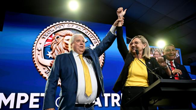 Australian businessman Clive Palmer and the leader of the Trumpet of Patriots party Suellen Wrightson celebrate during the federal election campaign launch of their 'Trumpet of Patriots' party. Picture: Getty