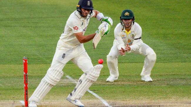 Jos Buttler steps on his wicket.