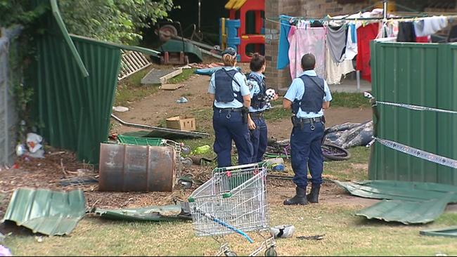 Police at the scene where the car tore through a suburban back yard. Picture: Supplied