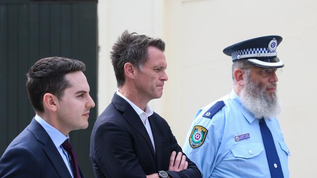 Chris Minns, Premier of New South Wales, David Ossip, President of the NSW Jewish Board of Deputies and Rabbi Mendel Kastel OAM, CEO of Jewish House, watch on during a press conference at Bondi to comment on the antisemitic vandalism of property that occurred overnight in Woollahra. Picture: NewsWire / Gaye Gerard