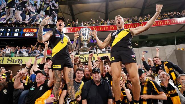 Dustin Martin and Noah Balta of the Tigers celebrate during their win against the Cats in the 2020 AFL grand final match at The Gabba. Picture: Getty Images