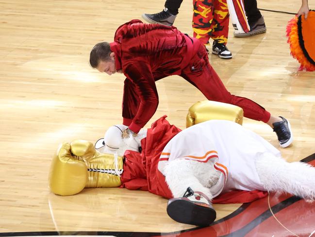 MIAMI, FL - JUNE 9: Connor McGregor and Mascot Burnie of the Miami Heat perform during halftime against the Denver Nuggets during Game Four of the 2023 NBA Finals on June 9, 2023 at Kaseya Center in Miami, Florida. NOTE TO USER: User expressly acknowledges and agrees that, by downloading and or using this Photograph, user is consenting to the terms and conditions of the Getty Images License Agreement. Mandatory Copyright Notice: Copyright 2023 NBAE (Photo by Joe Murphy/NBAE via Getty Images)