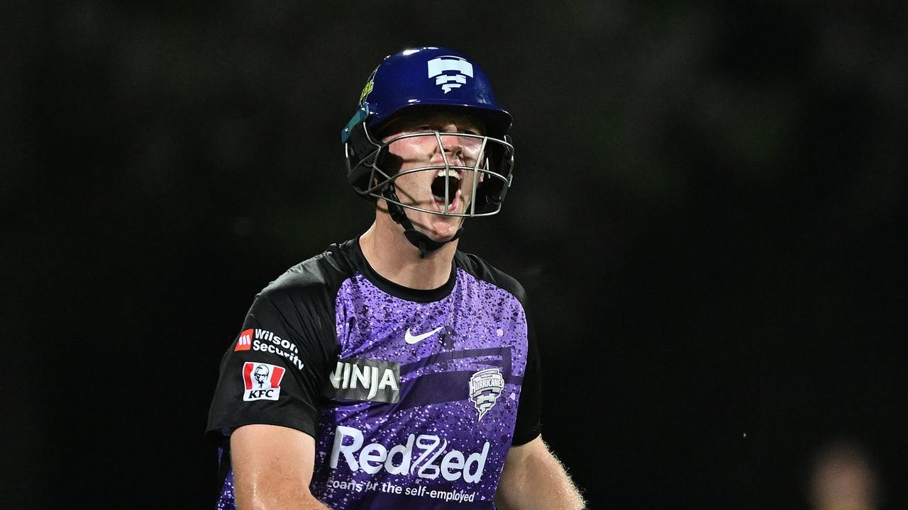 Mitch Owen celebrates his century. Photo: Steve Bell/Getty Images.