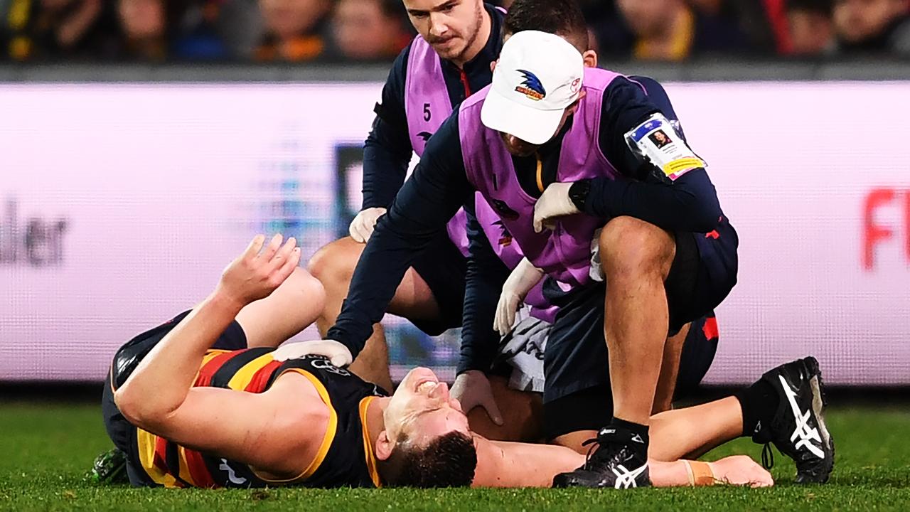 Josh Jenkins of the Adelaide Crows lies injured at the end of the game on Thursday night. Picture: Mark Brake/Getty Images