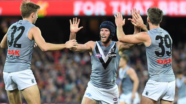 Brad Ebert celebrates a goal with teammates. Picture: AAP Images