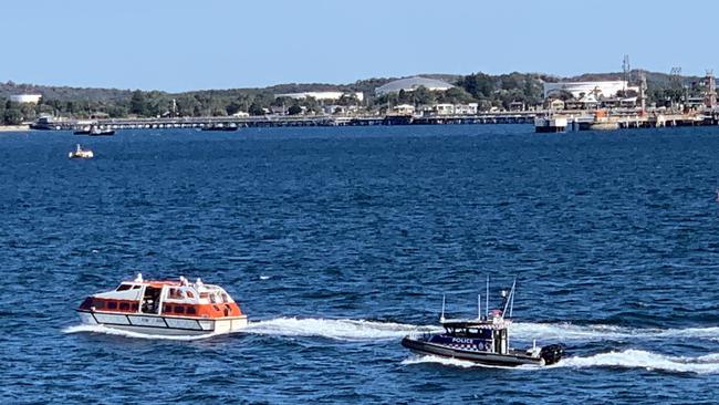 Sick crew from the Ruby Princess are dropped off at Port Botany on Sunday. Picture: Twitter