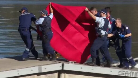 Emergency crews rush the girl to hospital. Picture: 9 News