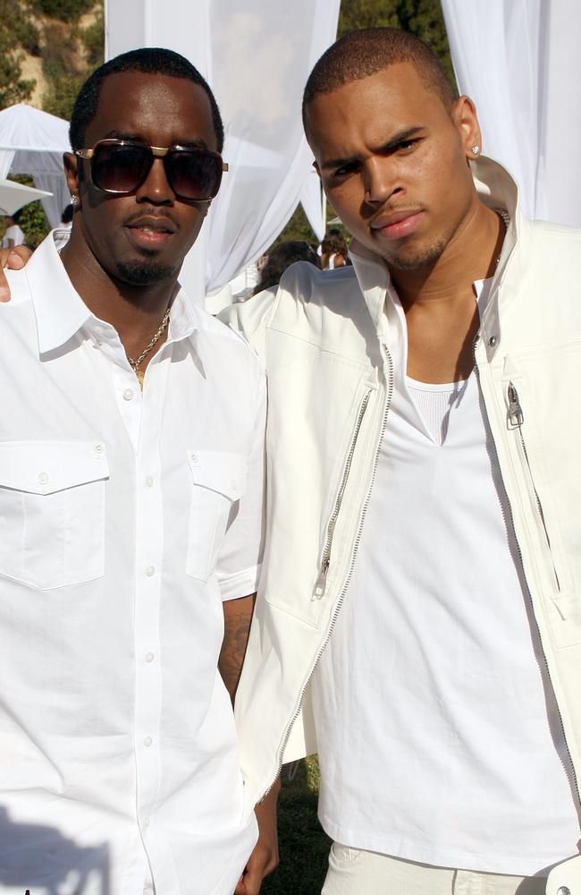 Combs and Brown attend the White Party hosted by Combs and Ashton Kutcher to help raise awareness for Malaria No More held at a Private Residence on July 4, 2009 in Beverly Hills, California. Picture: Jason Merritt/Getty Images