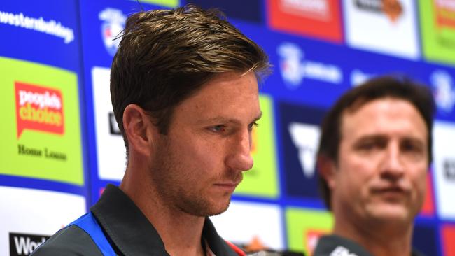 Western Bulldogs coach Luke Beveridge looks on as Dogs champ Matthew Boyd announces his retirement. Picture: AAP