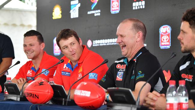 Gold Coast Suns player Steven May, Gold Coast Suns coach Stuart Dew, Port Adelaide Power coach Ken Hinkley and Port Adelaide Power player Travis Boak speak to the media during a press conference. Picture: David Mariuz/AAP