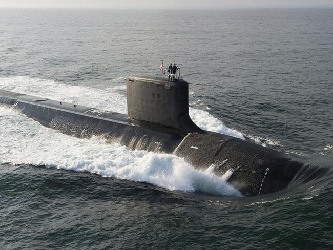 The Virginia-class USS North Dakota (SSN 784) submarine is seen during bravo sea trials in this U.S. Navy handout picture taken in the Atlantic Ocean August 18, 2013. The Navy commissioned its newest attack submarine North Dakota, during a ceremony October 25, 2014, at Submarine Base New London in Groton, Connecticut, defense officials announced. REUTERS/U.S. Navy/Handout  (MID-SEA - Tags: MILITARY) THIS IMAGE HAS BEEN SUPPLIED BY A THIRD PARTY. IT IS DISTRIBUTED, EXACTLY AS RECEIVED BY REUTERS, AS A SERVICE TO CLIENTS. FOR EDITORIAL USE ONLY. NOT FOR SALE FOR MARKETING OR ADVERTISING CAMPAIGNS