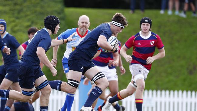 Action from the GPS First XV rugby match between Brisbane Grammar School and Brisbane State High School. Grammar’s Charlie McCauley attacks. Photo:Tertius Pickard