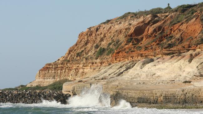 Waves pound Witton Bluff. Source: File