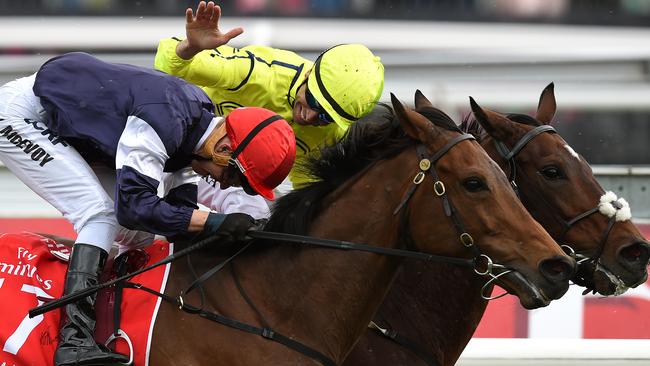 Joao Moreira congratulates Kerrin McEvoy after Almandin’s narrow win in a thrilling finish.