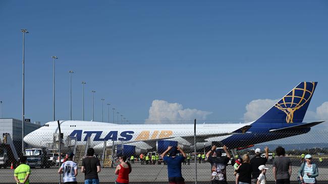 Crowds gathered to watch the mammoth move. Photo: Naomi Jellicoe