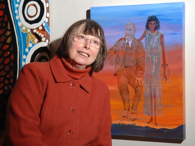 Winner of the annual Mil-Pra Aboriginal art exhibition Nyree Reynolds of Blayney with painting  " My Family "   at Liverpool Regional Musuem.