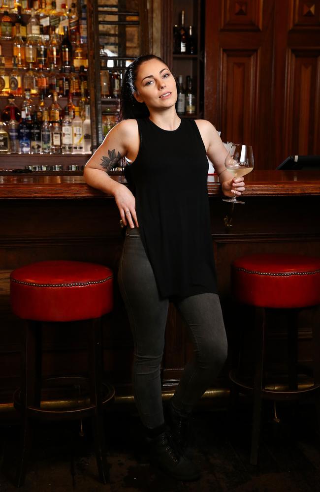 Billie-Jean Bray, 27, enjoys a wine at The Gresham Bar. General manager of the Gresham, Ryan Lane, has revealed new legislation will mean the venue has to shut people out in the middle of trading if his security staff needs to use the toilet. Picture: Liam Kidston.