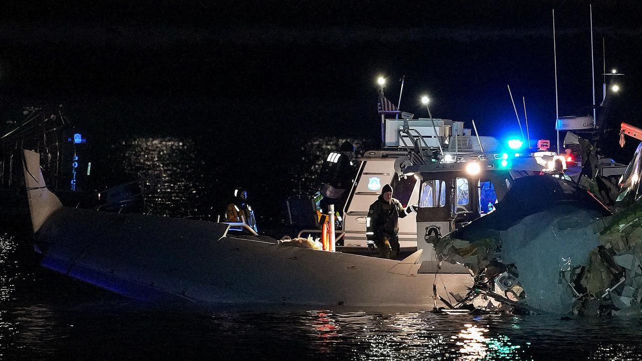 Emergency units respond to the wreckage in the Potomac River near Ronald Reagan Washington Airport. (Photo by Andrew Harnik/Getty Images via AFP)