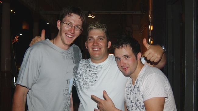 Troy Turner, Peter McGrady and Jason Wood on Flinders Street East Pic Bryan Lynch AD246040