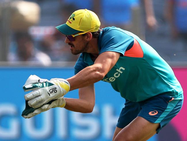 PUNE, INDIA - NOVEMBER 11: Mitchell Starc of Australia warms up ahead of the ICC Men's Cricket World Cup India 2023 between Australia and Bangladesh at MCA International Stadium on November 11, 2023 in Pune, India. (Photo by Robert Cianflone/Getty Images)