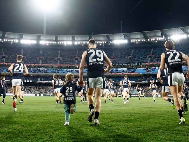 MELBOURNE, AUSTRALIA - JULY 28: George Hewett of the Blues enters the field during the 2023 AFL Round 20 match between the Collingwood Magpies and the Carlton Blues at The Melbourne Cricket Ground on July 28, 2023 in Melbourne, Australia. (Photo by Dylan Burns/AFL Photos via Getty Images)