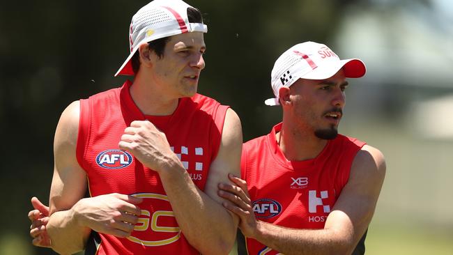 Gold Coast recruits Chris Burgess (left) and Izak Rankine.