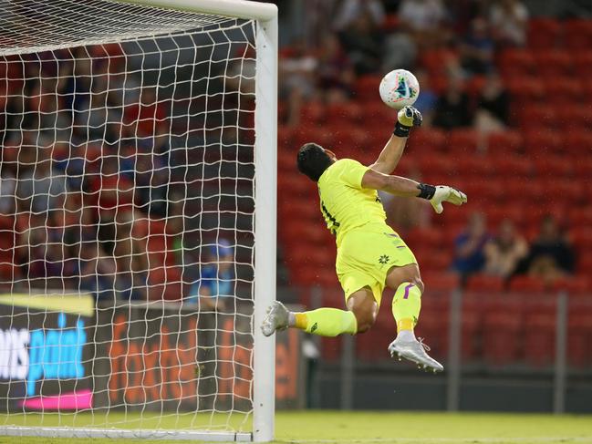 NEWCASTLE, AUSTRALIA - DECEMBER 28: Jamie Young of Brisbane Roar saves a goal during the round 12 A-League match between the Newcastle Jets and Brisbane Roar at McDonald Jones Stadium on December 28, 2019 in Newcastle, Australia. (Photo by Ashley Feder/Getty Images)