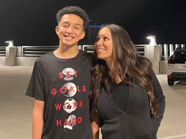 In this undated photo provided by Megan Garcia of Florida in October 2024, she stands with her son, Sewell Setzer III. The mother of 14-year-old Sewell Setzer III is suing Character.AI, the tech company that created a 'Game of Thrones' AI chatbot she believes drove him to commit suicide on Feb. 28. (Megan Garcia via AP)