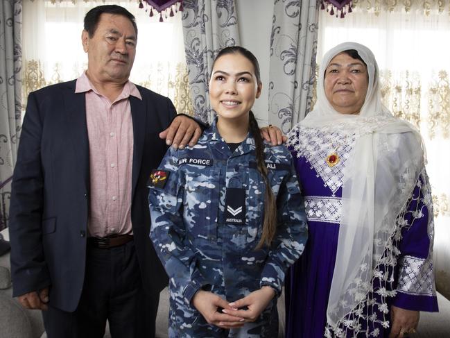 Woman of the Year Awards finalist Kbora Ali.Afghan refugee who has become a Corporal in the Australian Army. At home with Dad- Sultan AliMum- Shireen Gul Ali. 23rd February 2024 - Picture: Brett Hartwig