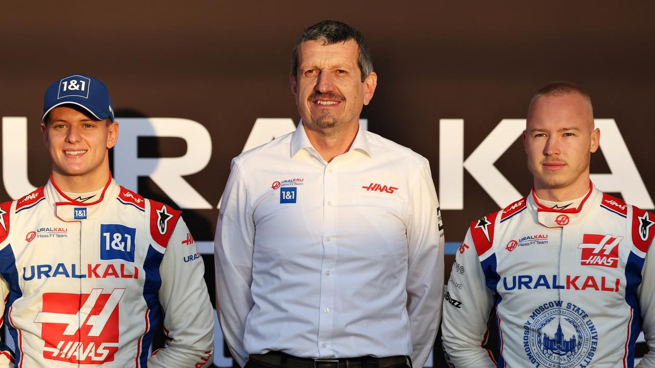 Mick Schumacher, Guenther Steiner and Nikita Mazepin in Barcelona. Photo by Mark Thompson/Getty Images