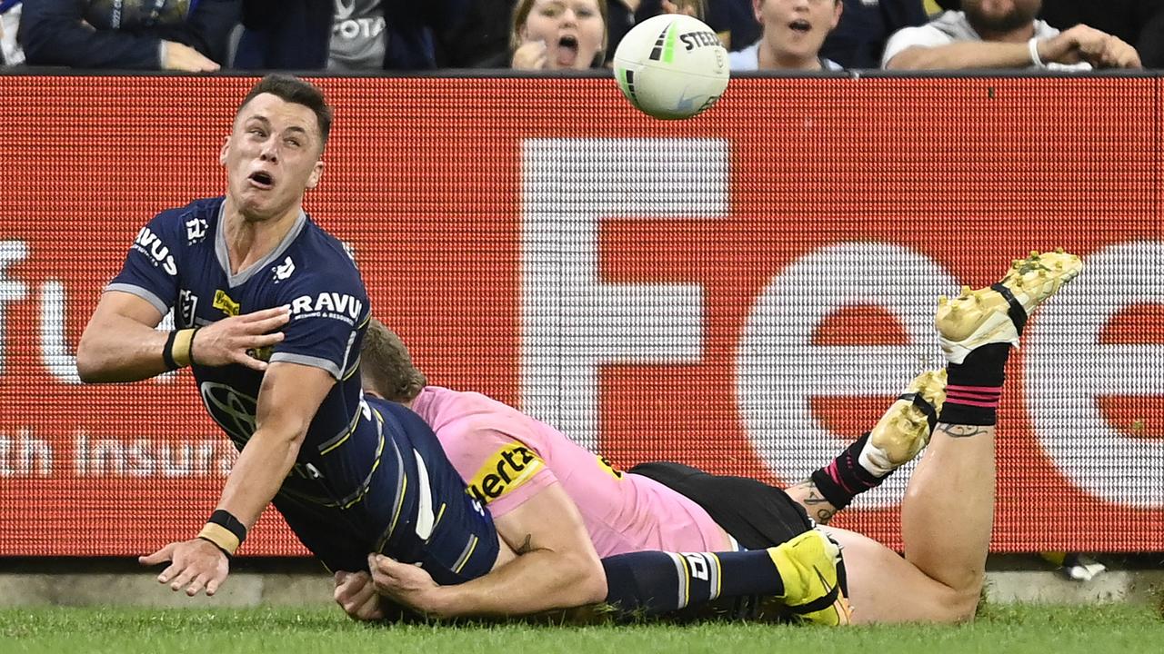 Eddie Blacker pulls down Scott Drinkwater. Picture: Ian Hitchcock/Getty