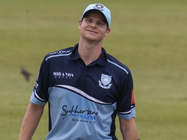 A dejected Steve Smith walks off the field after being caught out at Coogee oval today. David Warner's Randwick-Petersham v Steve Smith's Sutherland. The first time the two banned stars have come face to face on the field. Pic Jenny Evans