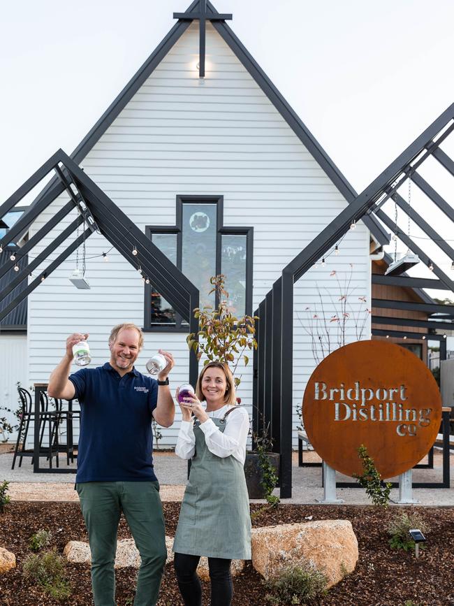 Bridport Distilling Co owners Jess and Chris Carins outside their new business which operates from a converted church. Picture: Olivia Sattler.