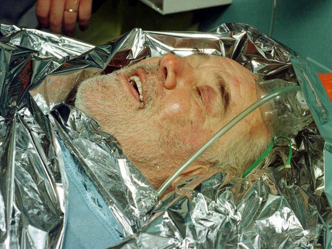 Yachtsman Tony Bullimore smiles as he is placed on a stretcher after he was rescued from the hull of his upturned yacht Global Exide Challenger in the Southern Ocean off WA in January 1997.