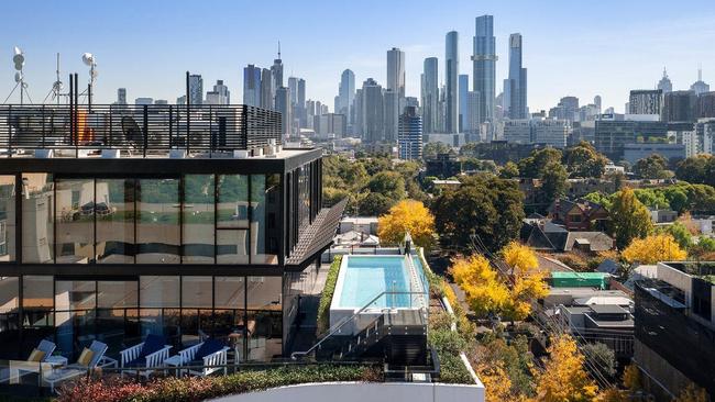 This South Melbourne apartment with a pool and impressive city views could become your home – for $5500 per week.