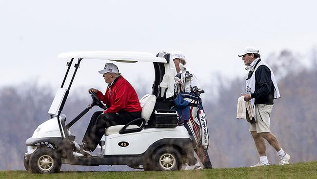 US President Donald Trump golfs at Trump National Golf Club after briefly appearing at the G20 summit. Picture: AFP