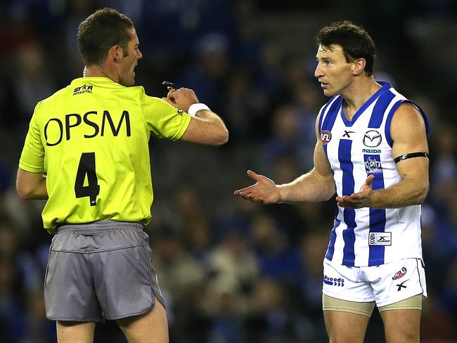 Brent Harvey was a tad bemused by umpire Luke Farmer’s calls during the second term. Picture: Wayne Ludbey